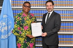 Photo from Zambian Foreign Ministry showcasing the delivery of the "instrument of accession" to the UN. Photo from Zambian Foreign Ministry showcasing the delivery of the "instrument of accession" to the UN.